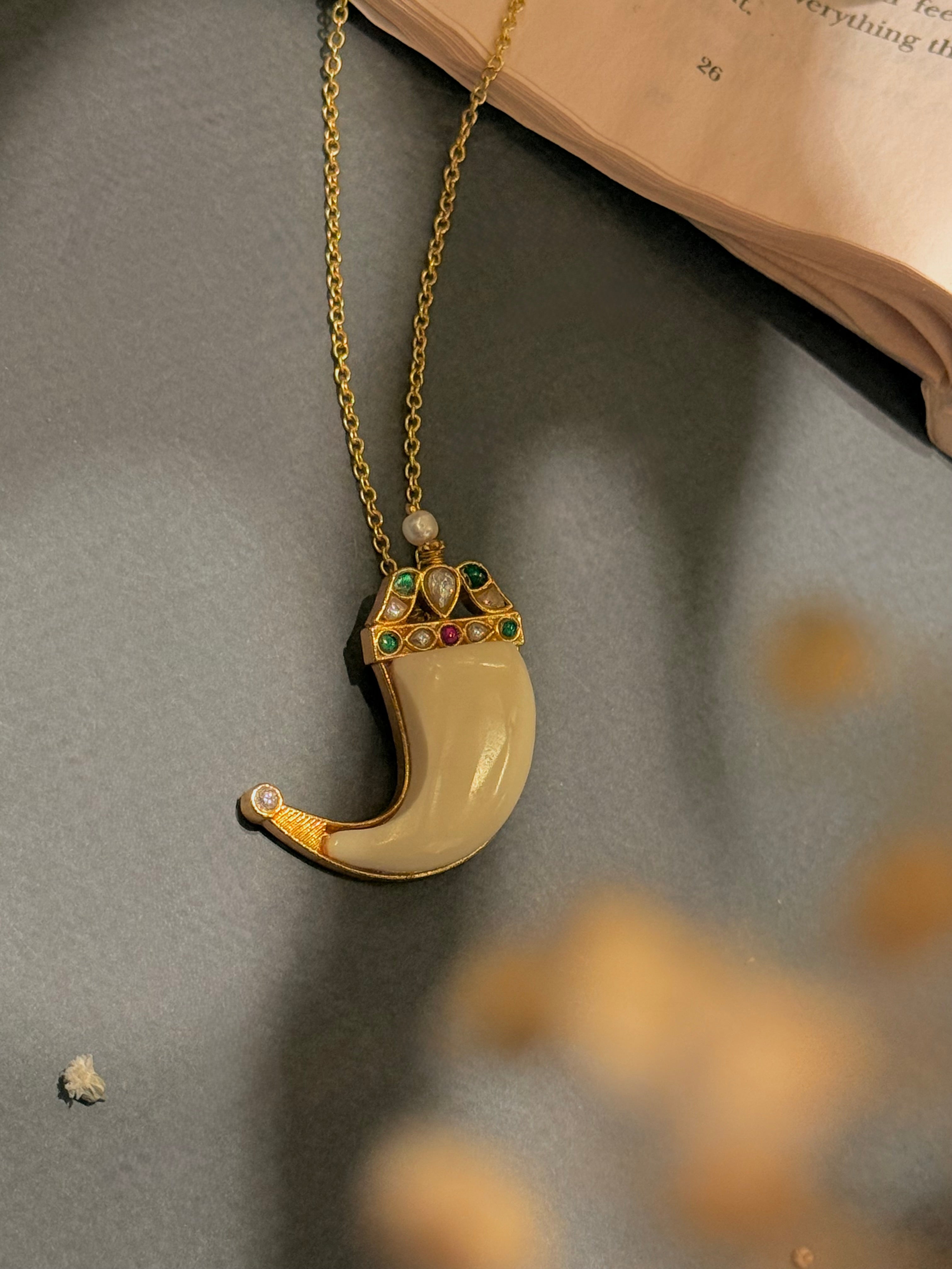 Tusk shape pendant