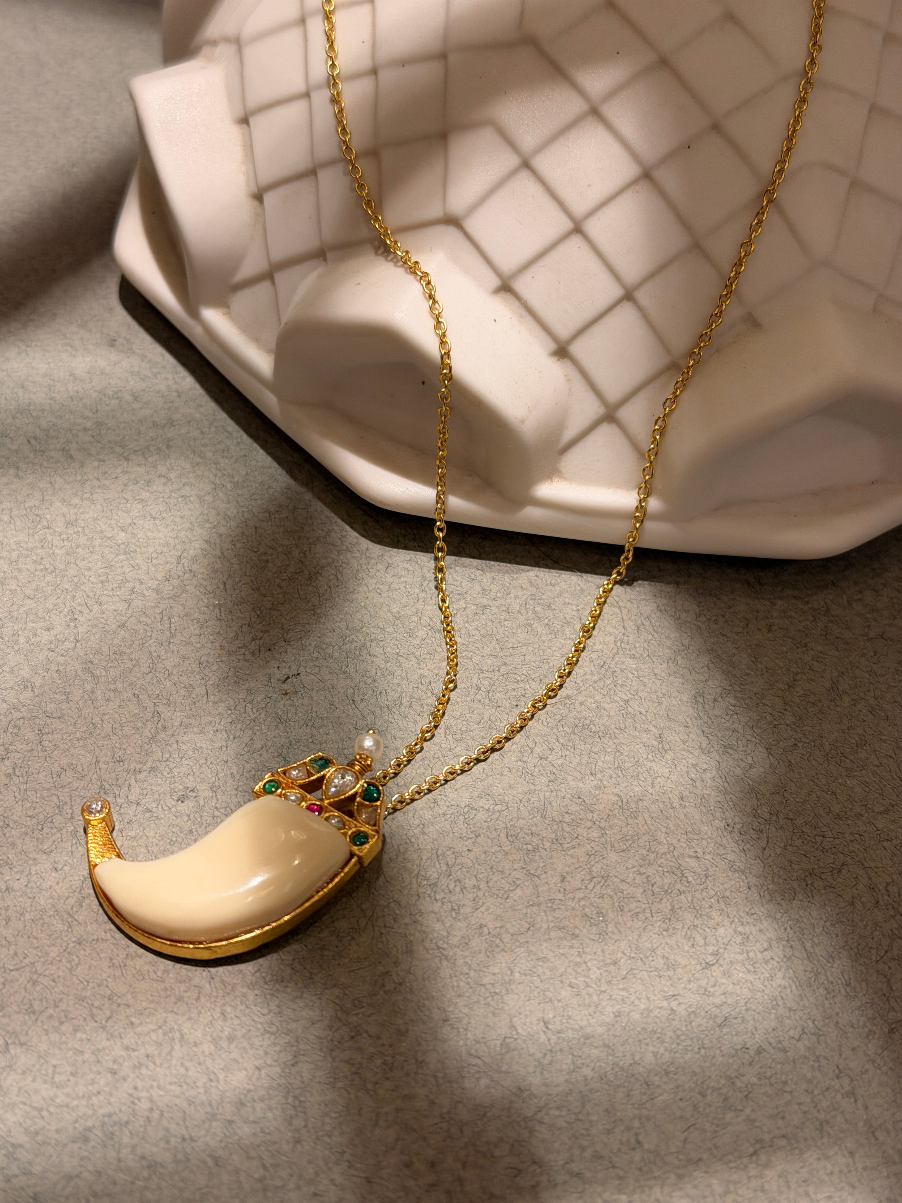 Tusk shape pendant