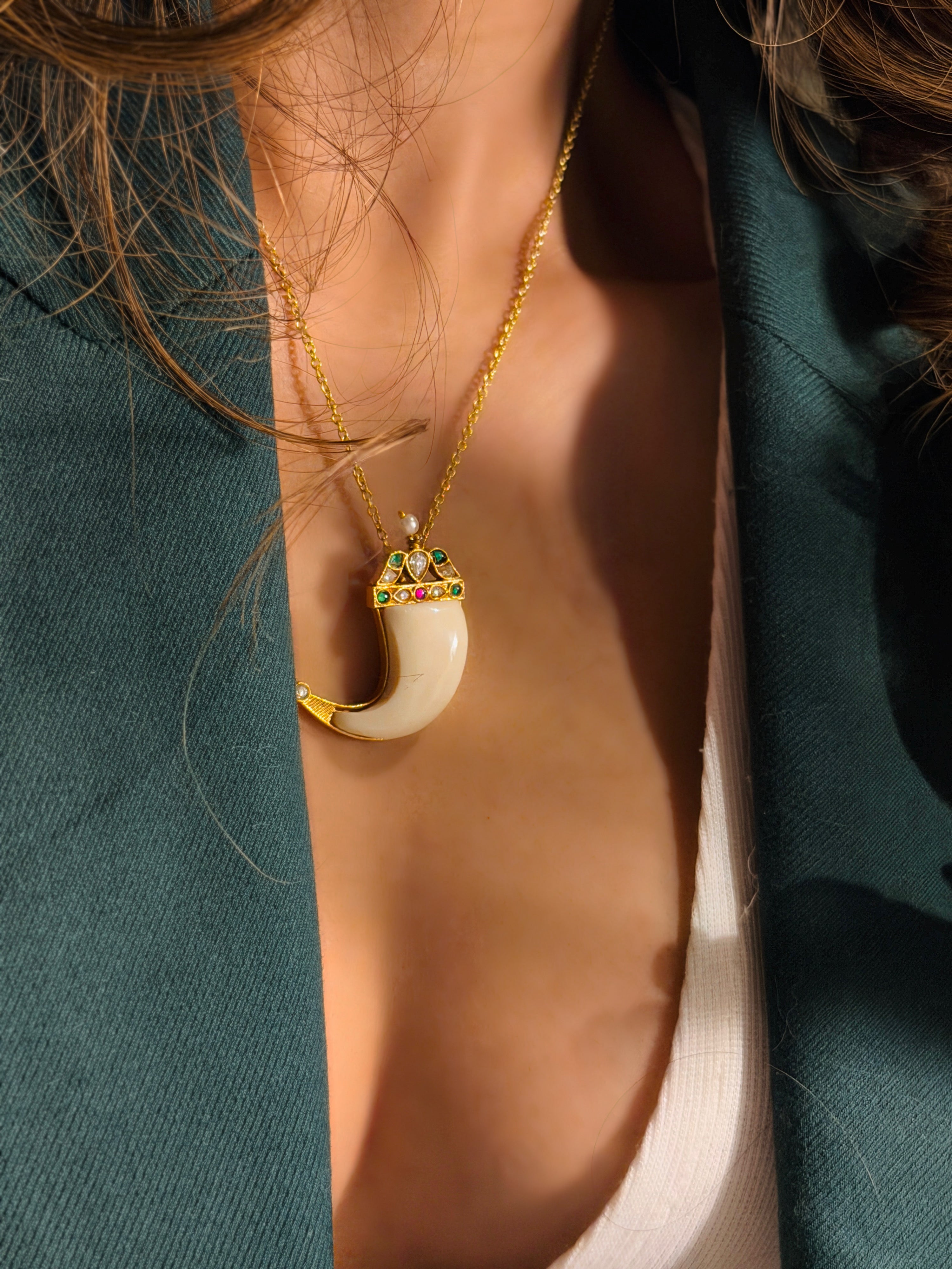 Tusk shape pendant