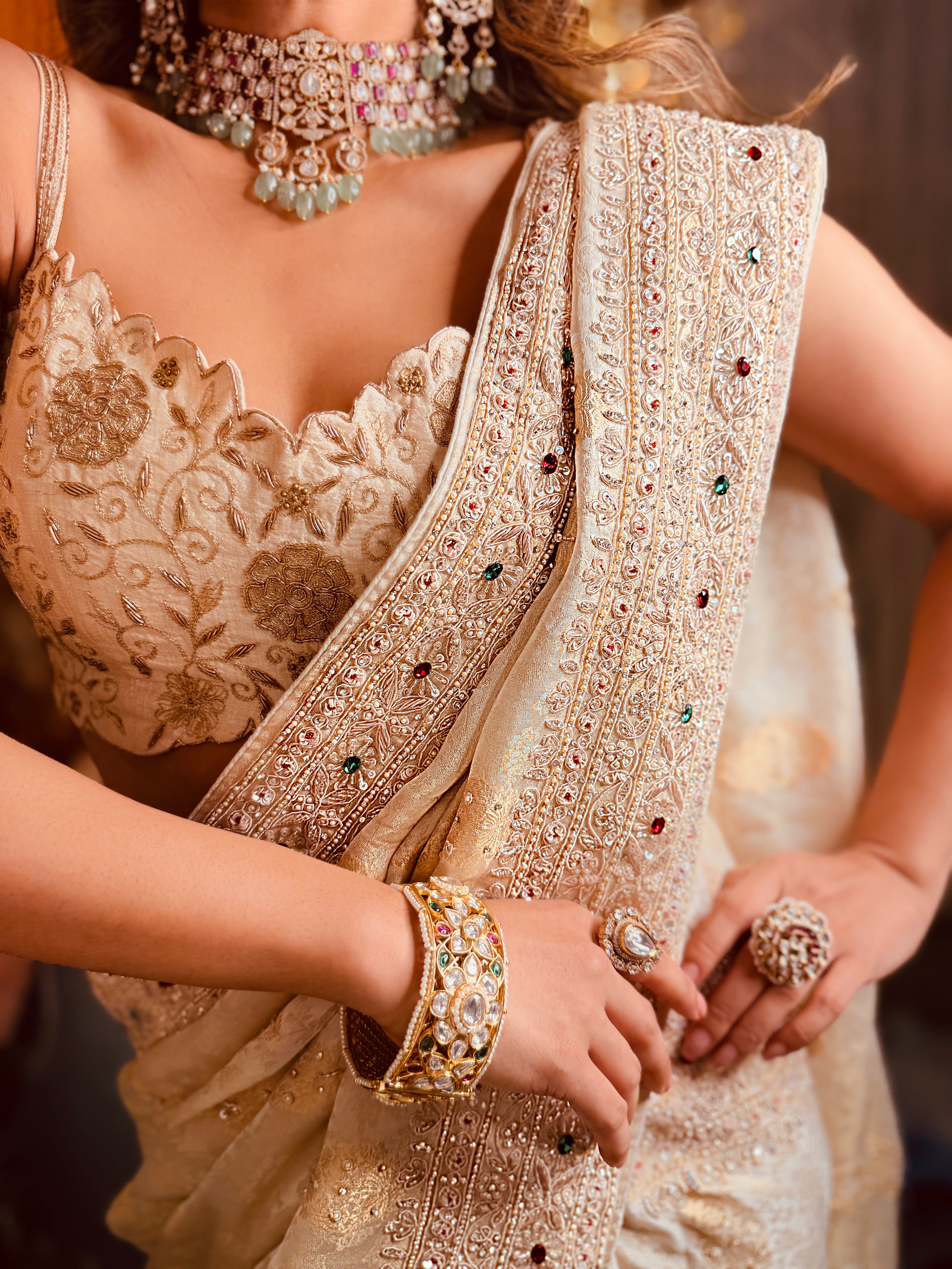 Ivory zari woven Chanderi Heavy Zardosi Hand-embroidered Saree with unstitched Blouse piece