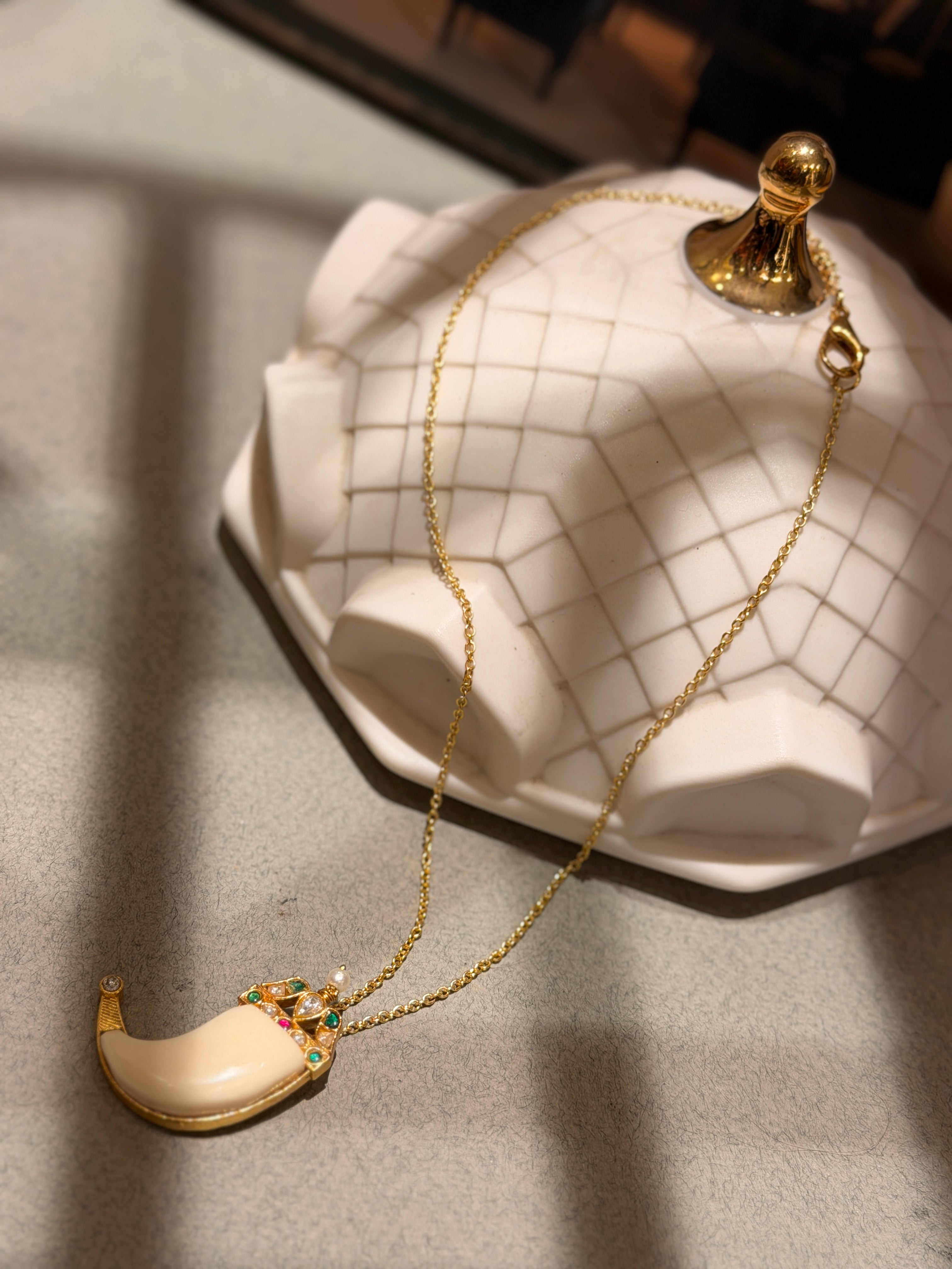 Tusk shape pendant