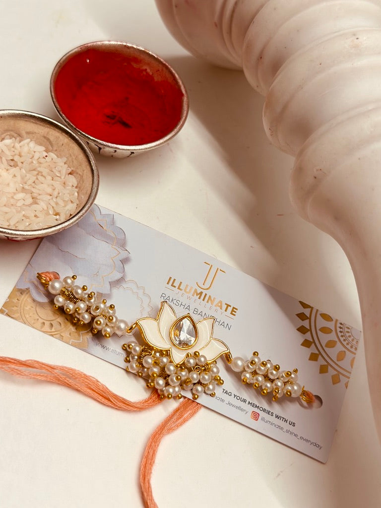 Safed Lotus Red Crystal Rakhi