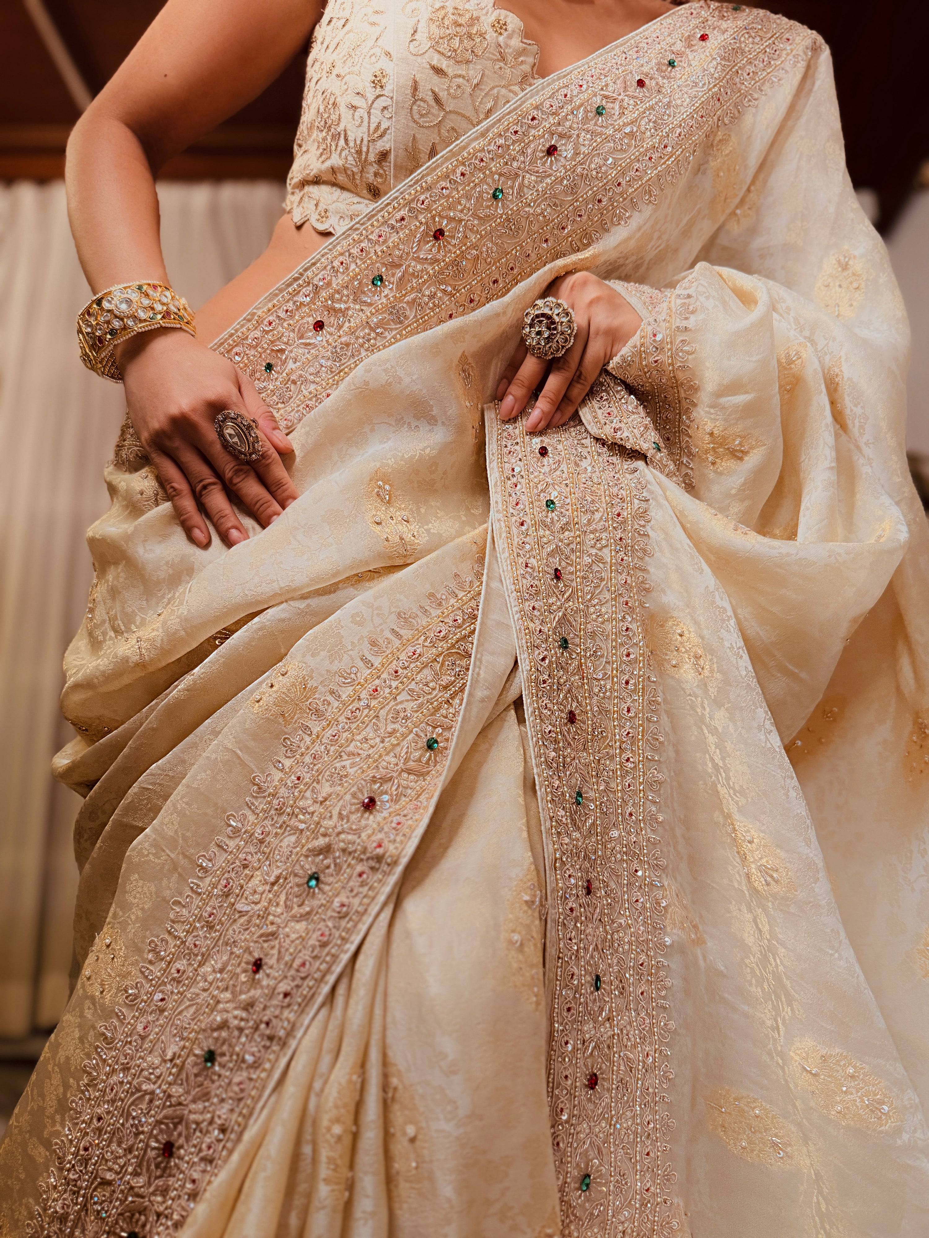Ivory zari woven Chanderi Heavy Zardosi Hand-embroidered Saree with unstitched Blouse piece