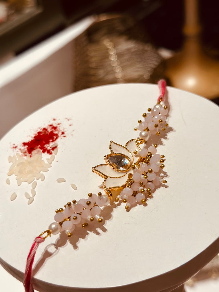 Safed Lotus Red Crystal Rakhi