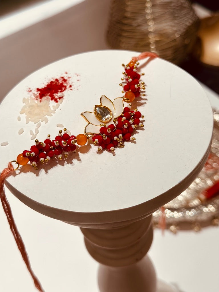 Safed Lotus Red Crystal Rakhi